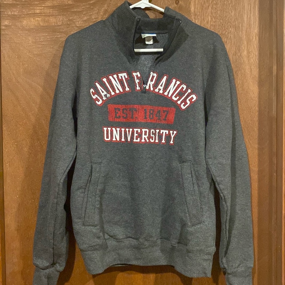Women’s partial zip long sleeve sweatshirt from St Francis University.
